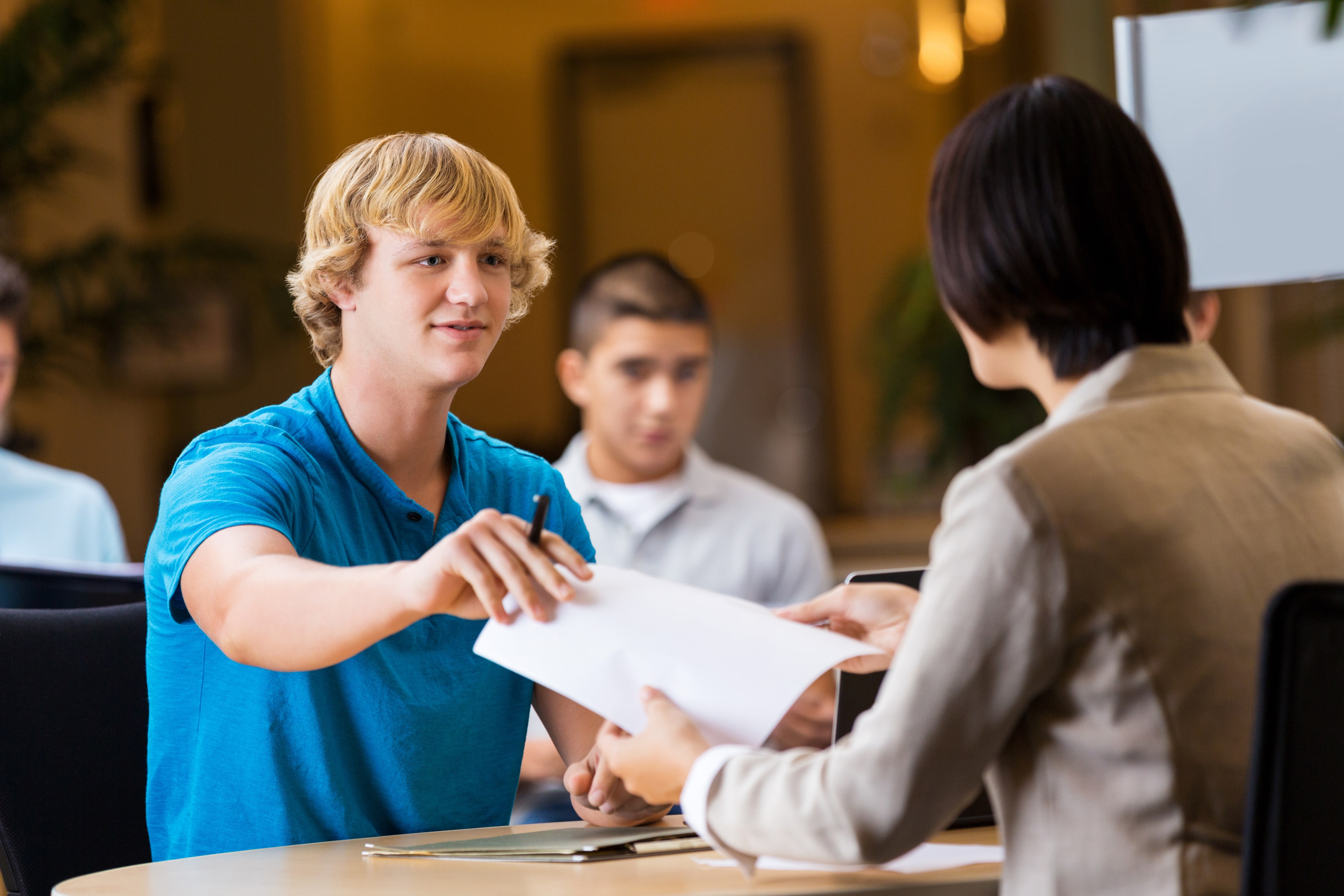 Young man with job application